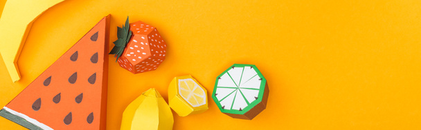 panoramic shot of multicolored handmade paper fruits isolated on orange with copy space - Fotoğraf, Görsel