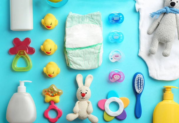Flat lay composition with baby accessories on color background - Fotoğraf, Görsel
