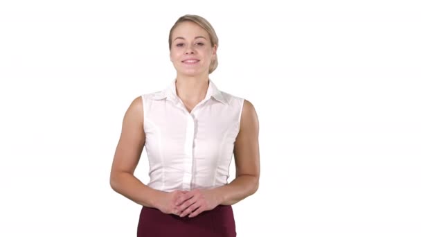 Beautiful woman smiling and looking to camera on white background. - Footage, Video
