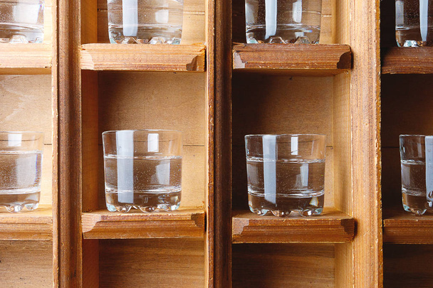 glasses for strong alcoholic drinks are each in its box - Photo, Image