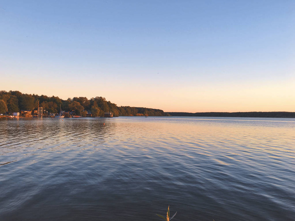 Sunset on the lake shore - Photo, Image