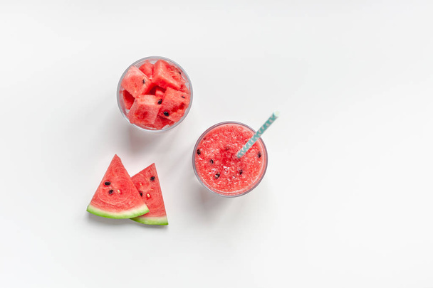 Watermelon smoothie with crushed fruits in glasses - Photo, Image