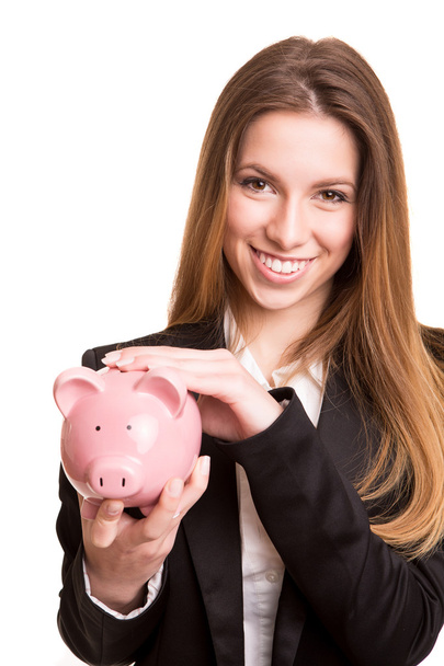Lächelnde Geschäftsfrau mit Sparschwein - Foto, Bild