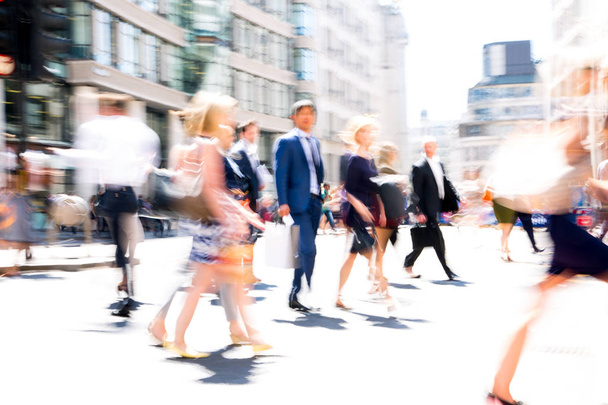 London, UK - 26 June, 2018: Business people and office workers crossing the road. Walking people motion blur. City of London busy business life. - Foto, imagen