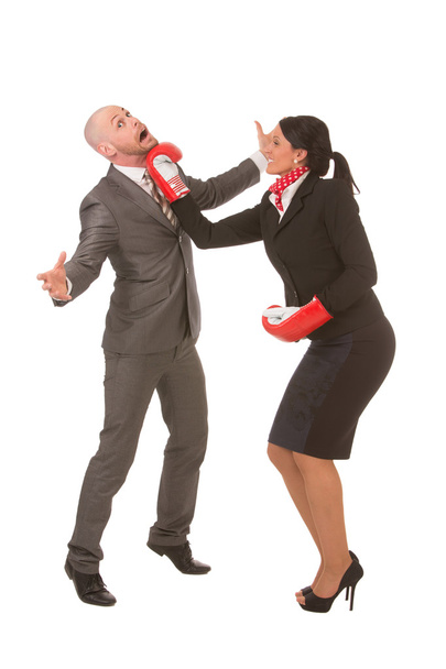 Funny businesswoman knocks-out male competitor - Fotoğraf, Görsel