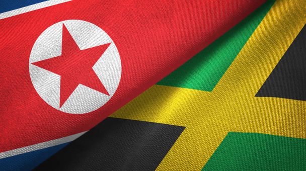 North Korea and Jamaica two flags textile cloth, fabric texture - Photo, Image