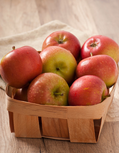 Ripe red apples on a wooden backgrounds - Photo, Image
