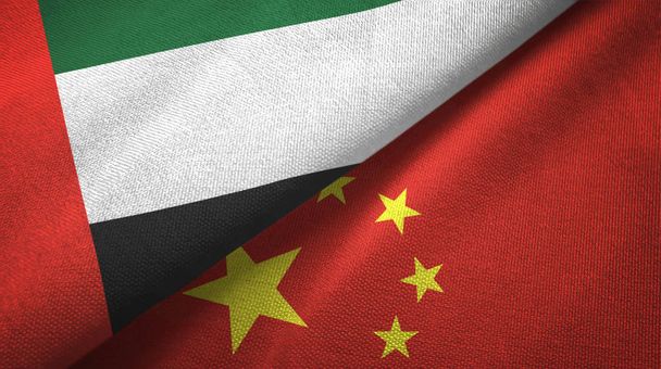 United Arab Emirates and China two flags textile cloth, fabric texture - Photo, Image