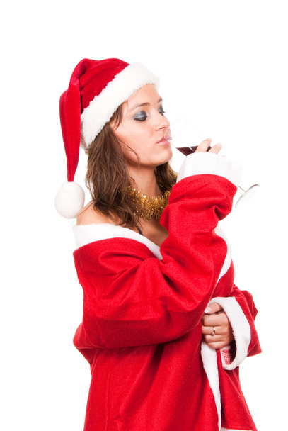 νεαρό σέξι κορίτσι santa με ποτήρι κρασί - Φωτογραφία, εικόνα