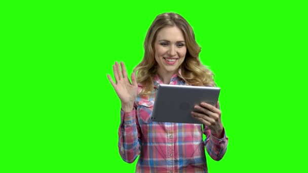 Woman having a video call on green screen. - Footage, Video