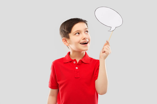 smiling boy in red t-shirt with speech bubble - Foto, Imagem