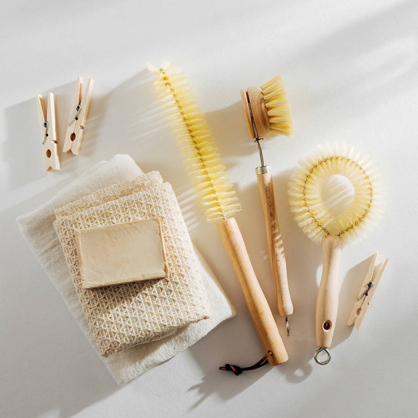 Zero waste, compostable cleaning tools. Wooden dish brush and clothespins. Eco friendly concept. - Valokuva, kuva