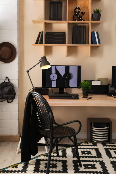 Stylish workplace interior with computer on table - Photo, image