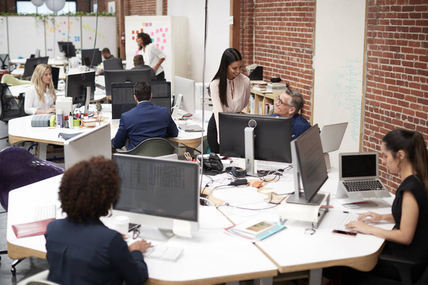 Business Team Working At Desks In Modern Open Plan Office - Foto, Imagem