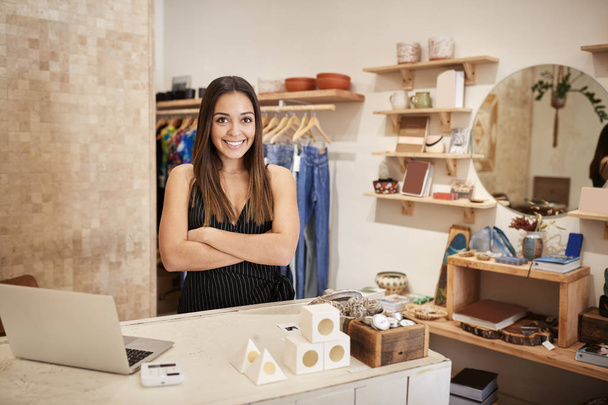 Portrait Of Female Owner Of Independent Clothing And Gift Store Behind Sales Desk - Fotoğraf, Görsel
