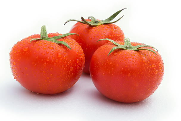 Fresh tomatoes on a white background - Photo, image