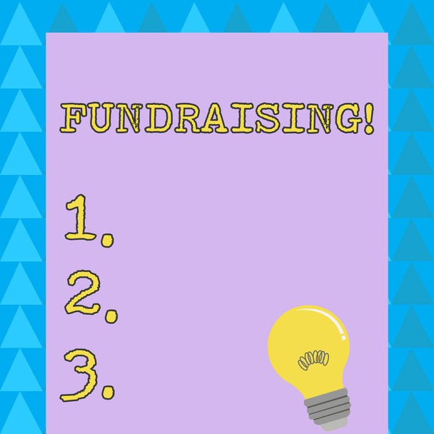 Word writing text Fundraising. Business concept for seeking to generate financial support for charity or cause Incandescent Light Bulb with Filament Inside Resting on Blank Color Paper. - 写真・画像