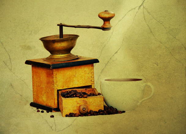 Molino de café y taza de café negro caliente
 - Foto, imagen