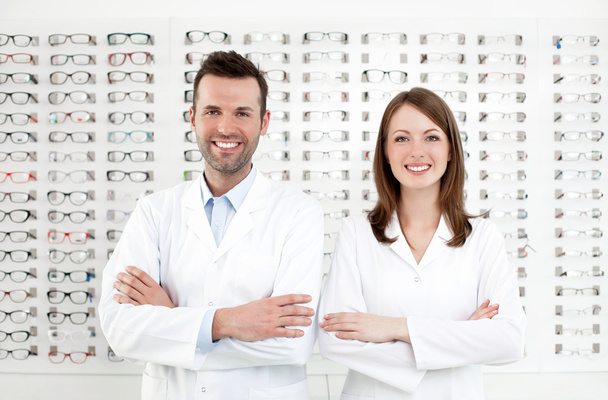 Team of happy opticians optometrists - Foto, immagini