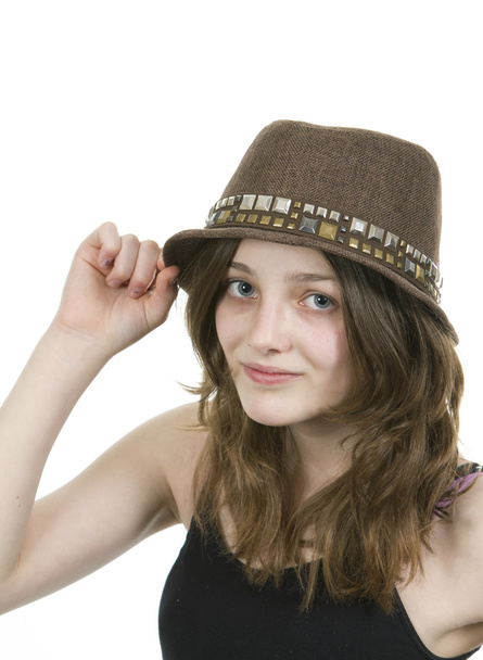 Young girl wearing a brown hat - Photo, Image