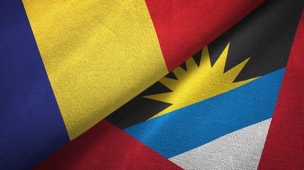 Romania ja Antigua ja Barbuda kaksi lippua tekstiilikangas, kangas rakenne
  - Valokuva, kuva