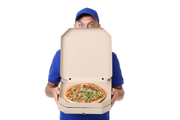 Delivery man with pizza in cardboard box isolated on white backg - Foto, Imagen