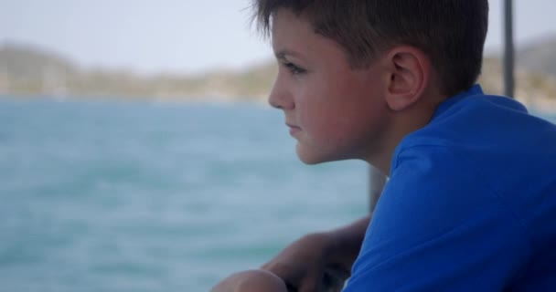 Boy enjoying boat trip. - Materiał filmowy, wideo