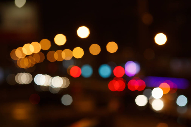 Abstract urban colorful night light bokeh, defocused background. - Foto, Bild