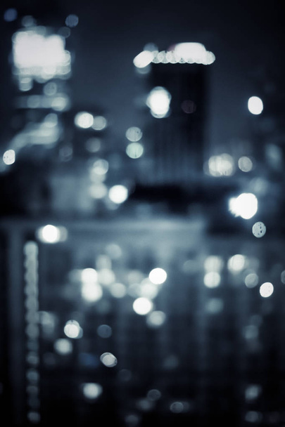 Big metropolitan city lights at night, blurry background - Photo, Image