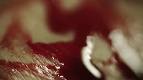 Sang sur peau humaine macro shot
 - Séquence, vidéo