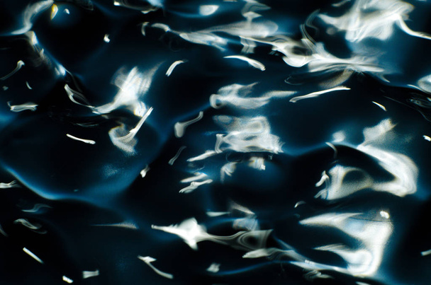 Close up texture of water under the influence of vibration in 432 hertz - Photo, Image