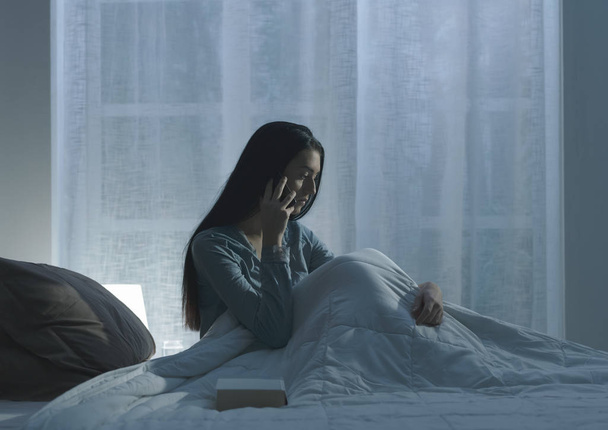 Sad woman suffering from insomnia in her bed - Zdjęcie, obraz