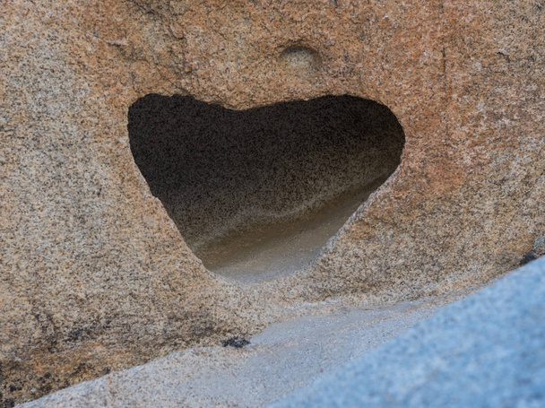 Комірчину каменю й піску, у формі серця - Фото, зображення