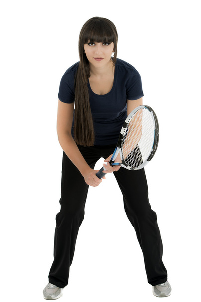 A pretty, athletic female tennis player isolated on a white back - 写真・画像
