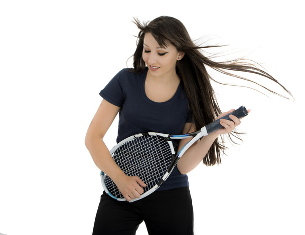 Happy female tennis player playing on racket as on guitar - Photo, Image