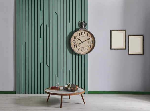 Green wall background with clock and frame style in the room - Foto, imagen