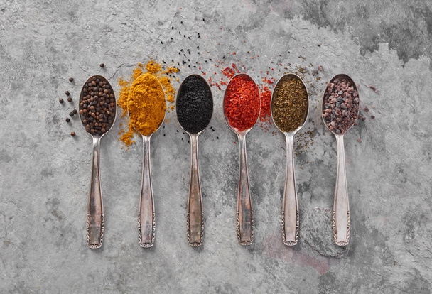 Spoons with spices - 写真・画像