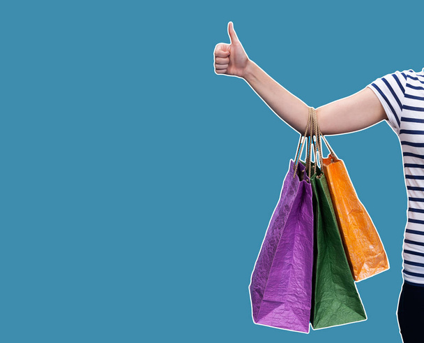 Happy young woman with shopping bags - Photo, Image