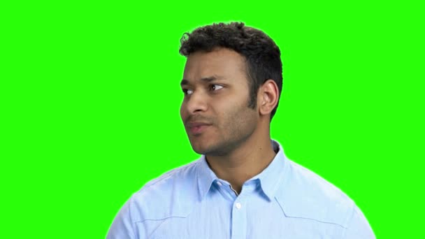 Upset young man on green screen. - Footage, Video