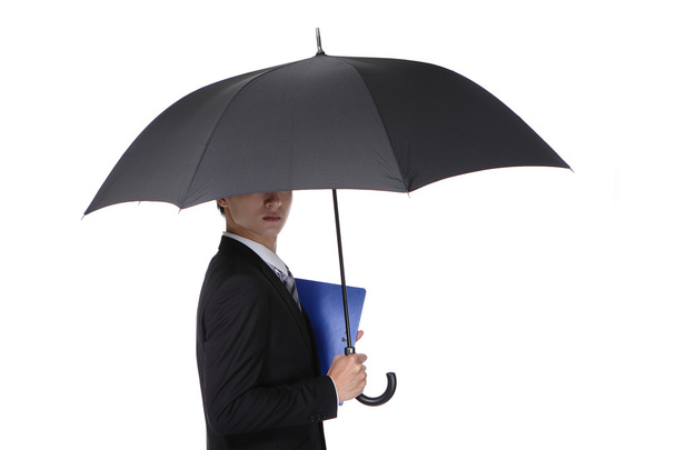 Business Man with an umbrella - Foto, Imagen