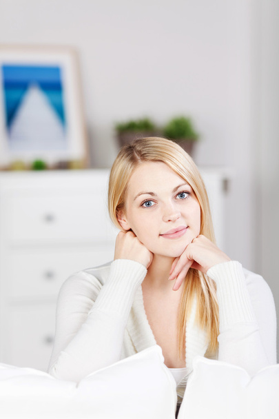Young Woman Smiling While Sitting At Home - Fotoğraf, Görsel