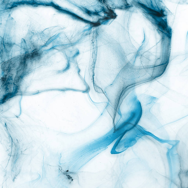 Colorful blue ink  on white paper background. Texture - Foto, afbeelding
