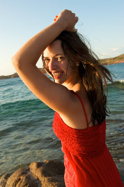 retty young woman relaxing on the beach with a free feeling - Φωτογραφία, εικόνα