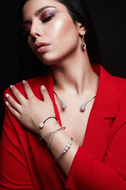 Beautiful Girl in Jewelry and red suit - Foto, immagini