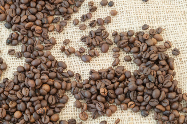 beautiful macro background of coffee with jute - Фото, изображение