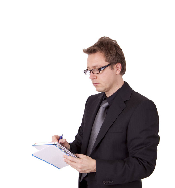 Business man is taking notes - Фото, зображення