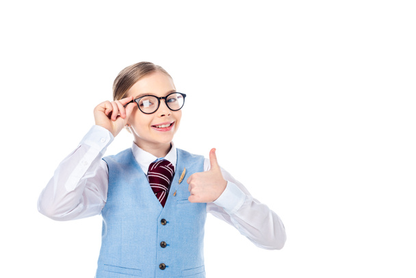 happy schoolchild in glasses doing thumb up sign Isolated On White with copy space - Photo, Image