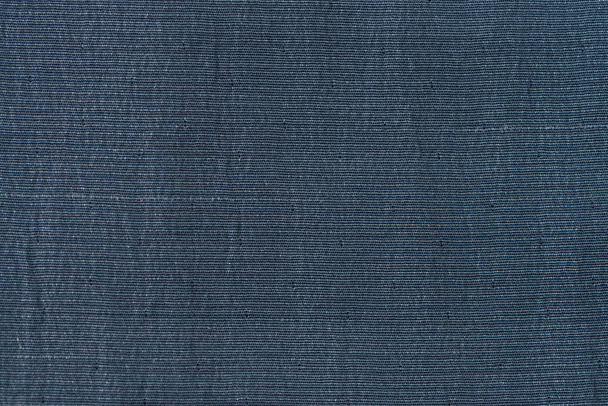 Background made of a closeup of a blue fabric texture - Фото, изображение