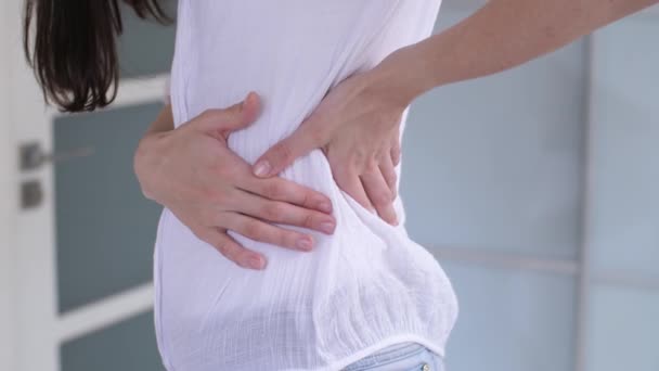 Woman has backache - Felvétel, videó