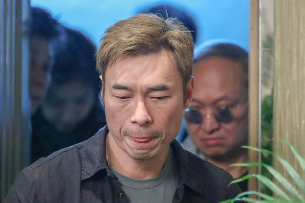Hong Kong singer Andy Hui or Hui Chi-on arrives for a press conference to apologize to the public for cheating on his superstar wife Sammi Cheng in Hong Kong, China, 16 April 2019. - Zdjęcie, obraz